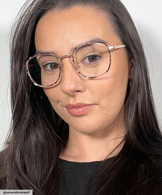 Model wearing the Stunner Square blue light blocking glasses in tortoiseshell