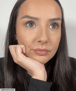 Model wearing Sunlit Deep Blue prescription circle contact lenses on naturally brown eyes