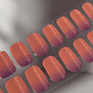 EyeCandys Sunset Sangria Gel nail sticker featuring a vibrant ombré blend of burnt orange and plum with subtle shimmer. This semi-cured gel set captures the warmth of a summer sunset—perfect for bold, statement manicures with effortless, long-lasting wear.