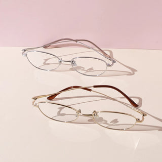 Eyecandys Zephyr Titanium Oval Full Frame Glasses for Unisex, offering a lightweight, durable frame with a modern oval shape. Perfect for those seeking high-quality, fashion-forward eyewear