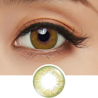 Close-up shot of model's eye adorned with Acuvue 1-Day New Define Fresh Green color contact lens dailies, complemented by clean eye makeup, showing the brightening effect of the green contact lens on dark brown eyes, above a cutout of the colour contact lens design with radial spiked pattern