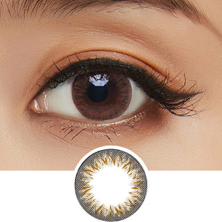 Close-up shot of model's eye adorned with Clalen Iris Latin Brown daily color contact lenses with prescription, paired with clean-girl eye makeup, showing the brightening and enlarging effect of the circle contact lens on dark brown eyes, above a cutout of the contact lens with limbal ring on a white background.