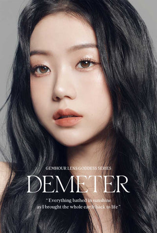 Asian model demonstrating a K-idol-inspired look with Gemhour Demeter 1-Day Ash Grey (10pk) coloured contact lenses, highlighting the instant brightening and enlarging effect of the circle contact lenses over dark irises.