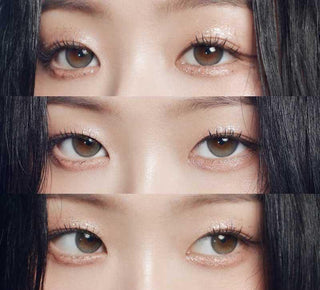 Asian model demonstrating a K-idol-inspired look with Gemhour Demeter 1-Day Ash Grey (10pk) coloured contact lenses, highlighting the instant brightening and enlarging effect of the circle contact lenses over dark irises.