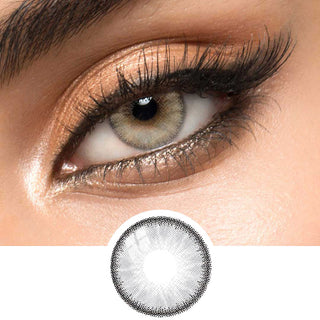 Detailed view of EyeCandys desire mist grey contact lens on a brown eye which also includes a close-up detail of the contact lens.