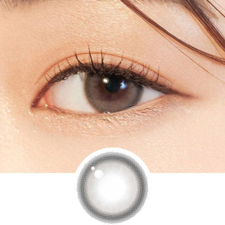 Close-up shot of model's eye adorned with Gemhour Everyday Essentials Grey daily color contact lenses with prescription, complemented by clean eye makeup, showing the brightening and enlarging effect of the circle contact lens on dark brown eyes, above a cutout of the contact lens pattern with limbal ring on a white background.