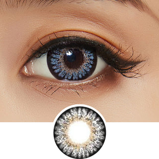 Close-up of model's eye featuring Bambi Grey contact lens, complemented by peach eyeshadow, with a cut-out of the same lens below