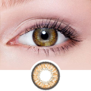 Close-up shot of model's eye adorned with Eyelighter Brown colored contacts for astigmatism, complemented by clean eye makeup, above a cutout of the brown contact lens itself showing the dense starburst pattern.