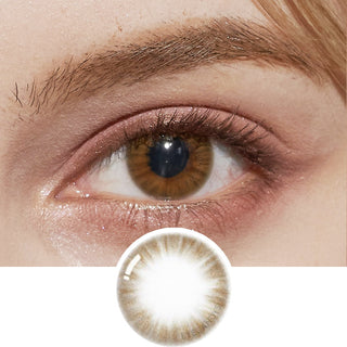 A close-up image captures the eye of a model highlighting the Pink Label Flirty Choco contact lens, complemented by peach eyeshadow, with an additional illustration displaying the lens for contrast.