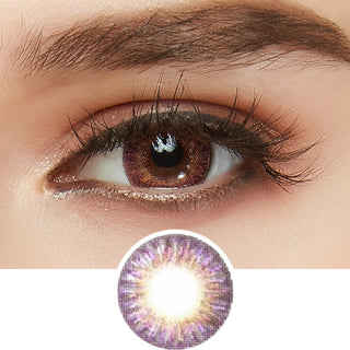 Tri-Color purple color contact lens on top of a dark brown eye paired with light brown eyeshadow and curled wispy eyelashes, above the prescription contact lens pattern.