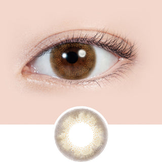 Close-up shot of model's eye adorned with Lilmoon 1-Day Rusty Beige (10pk) color contact lenses prescription, paired with clean-girl eye makeup, showing the brightening and enlarging effect of the circle contact lens on dark brown eyes, above a cutout of the contact lens with limbal ring on a white background.
