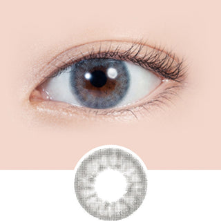 Close-up shot of model's eye adorned with Lilmoon 1-Day Smokey Grey (10pk) color contact lenses prescription, paired with clean-girl eye makeup, showing the brightening and enlarging effect of the circle contact lens on dark brown eyes, above a cutout of the contact lens with limbal ring on a white background.