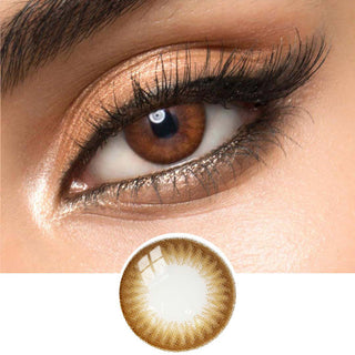 Close-up of Melbourne Gold circle lenses on a model's eye, showing the realistic subtle enlarging effect.