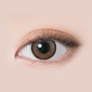 Design of the i-Sha Molton Ash Brown coloured contact lens from Eyecandys on a white background, showing the pixel dotted detail and limbal ring.