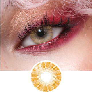 Close-up view of natural brown contact lens on a medium brown eye, paired with bold red eye makeup, next to a cutout of the contact lens