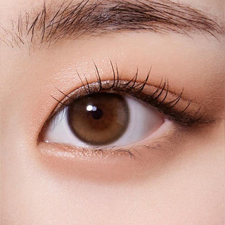 Macro shot of an eye wearing the Olola Purity Shine 1-Day Hazel Brown (10pk) (KR) prescription colour contact lens, showing the multi-colored detail and natural effect on dark brown eyes.