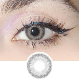 Composite of a dark brown eye wearing the Sugarlook Grey color contact lens, above the graphic design of the grey contact lens itself.