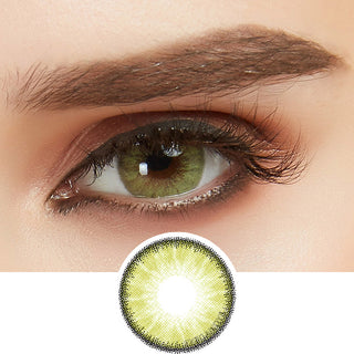 Close-up shot of a model wearing Desire Lush Green prescription colored contact lens in one eye, on top of the contact lens pattern design.