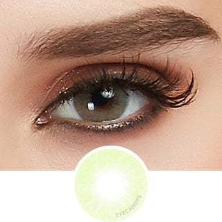Closeup of the glossy green Color Contact Lens worn on a dark eye, with a thumbnail showing the color lens pattern.