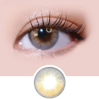 Macro shot of an eye wearing the i-Sha Arendelle Grey prescription colour contact lens, showing the multi-colored detail and natural effect on dark brown eyes, with clean eye makeup. At the bottom is the pattern of the colored lens design, showing the dotted detail and pigmentation.