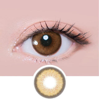 Macro shot of an eye wearing the i-Sha Melo Art Almond Brown prescription colour contact lens, showing the multi-colored detail and natural effect on dark brown eyes, with clean eye makeup. At the bottom is the pattern of the colored lens design, showing the dotted detail and pigmentation.