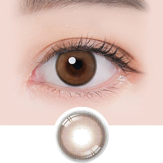 Macro shot of an eye wearing the i-Sha Ariel 1-Day Brown (10pk) prescription colour contact lens, showing the multi-colored detail and natural effect on dark brown eyes, with clean eye makeup. At the bottom is the pattern of the colored lens design, showing the dotted detail and pigmentation.