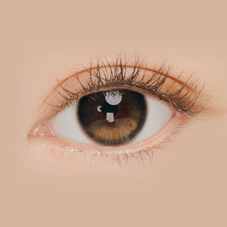 Macro shot of an eye wearing the i-Sha Oriana Edge Plus Shade Grey prescription colour contact lens, showing the multi-colored detail and natural effect on dark brown eyes.