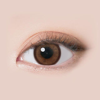 Design of the i-Sha Molton Amber Brown coloured contact lens from Eyecandys on a white background, showing the pixel dotted detail and limbal ring.