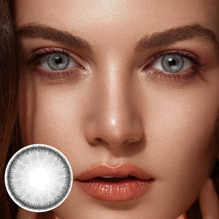 Model showcasing the natural look with desire mist grey circle contact lenses, with cutout detail of the same grey lens beside