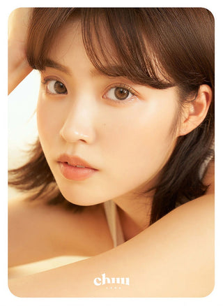 Asian model demonstrating a K-idol-inspired look with Chuu Sunny Cookie Grey coloured contact lenses, highlighting the instant brightening and enlarging effect of the circle contact lenses over dark irises.