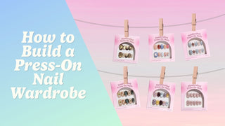 Five press-on nail sets in storage boxes arranged as a curated nail wardrobe