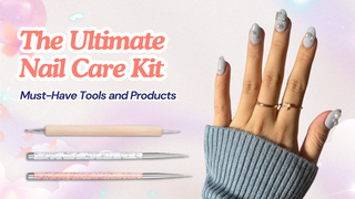Hand with pearl-adorned grey oval nails beside nail art brushes and a dotting tool for manicure essentials.