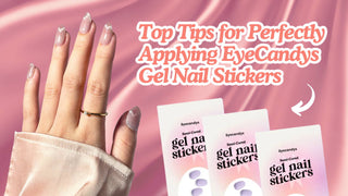 A hand with shimmering glitter nails beside EyeCandys gel stickers on pink satin.
