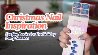 A hand with blue holographic festive nails holds a box of EyeCandys gel nail stickers.