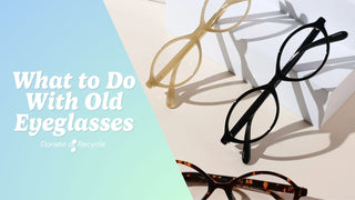 A small collection of old eyeglasses beside a case and cleaning cloth