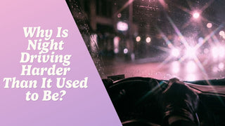 View from the driver's seat of oncoming headlight glare on a dark highway at night