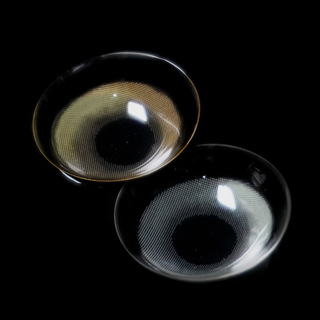 Macro photo of EyeCandys Amelie Biscuit Brown and  Earl Grey prescription colored contact lenses showcasing the thin material and cosmetic lens design