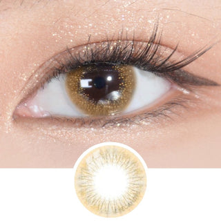 Prescription EyeCandys Attitude Glitter Brown contact lens worn on eye, close-up view highlighting lens pattern.