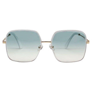 The EyeCandys Bermuda Oversized Square Sunglasses feature large, square lenses with a gradient tint from blue to clear. The thin gold frame adds a touch of elegance, complemented by a minimalist bridge and clear nose pads. These sunglasses are also available in chic Glacier and Pink Swizzle colors.
