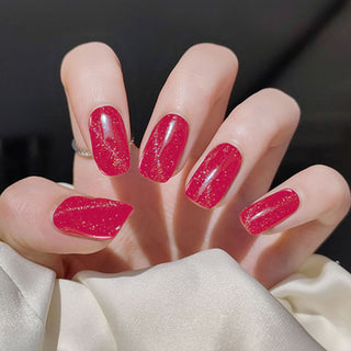 An image of a hand model showcasing the Candy Cane Nail Gel Sticker. 