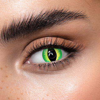 A woman's eye showcasing vibrant green and black cat eyes, created with Eyecandys Cosplay Green Dragon contact lenses perfect for Halloween.