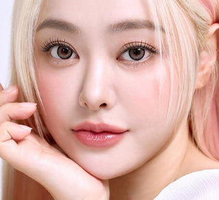 Model showcasing the natural look using i-Sha Dekame Hug Me Brown prescription colored contact lenses, above a closeup of a pair of eyes enhanced and widened by the circle lenses.