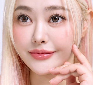 Model showcasing the natural look using i-Sha Dekame Hug Me Brown prescription colored contact lenses, above a closeup of a pair of eyes enhanced and widened by the circle lenses.