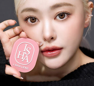 Model showcasing the natural look using i-Sha Dekame Hug Me Taupe prescription colored contact lenses, above a closeup of a pair of eyes enhanced and widened by the circle lenses.