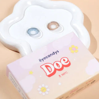 Eyecandys Doe contact lens case with contact lenses on a beige background