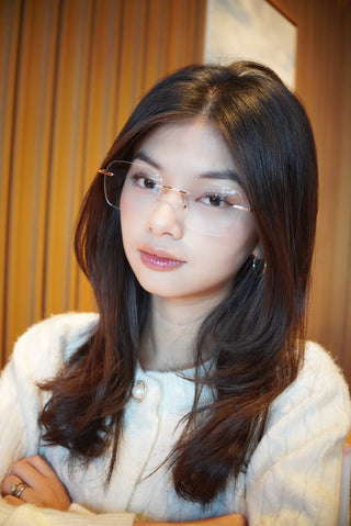 Close-up of a woman in EyeCandys blue light blocking reading glasses. Best anti-glare prescription glasses for digital screen protection