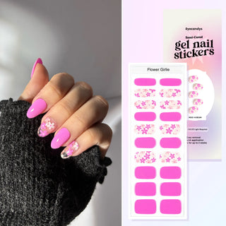  Hand wearing Eyecandys Flower Girlie Gel Nail Stickers – bold Barbie-pink with daisy floral accents, fun Y2K-inspired nail design, quick 10-minute application, safe 7-free formula, lasts up to 2-3 weeks.