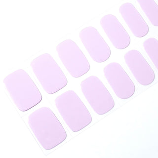 Angled image of semi-cured gel nail stickers in the design 'French Lavender,' featuring a classic light purple base for an elegant simple manicure look.