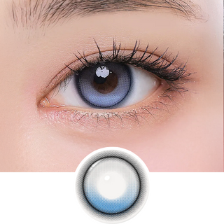 i-Girl One Pick Summer Song color contact lens on top of a dark eye paired with subtle eye makeup and curled wispy eyelashes, above the contact lens design.