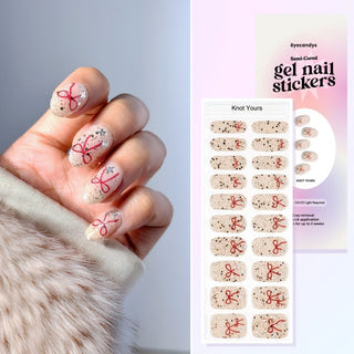 Hands with EyeCandys Knot Yours Gel Nail Stickers, featuring a chic design. Perfect for creating trendy and stylish nails. Ideal for gel nail lovers, easy-to-apply nail stickers for a flawless, long-lasting manicure